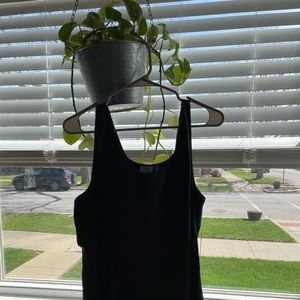 Sleeves tops can be worn convertible 95% silk 5% spandex